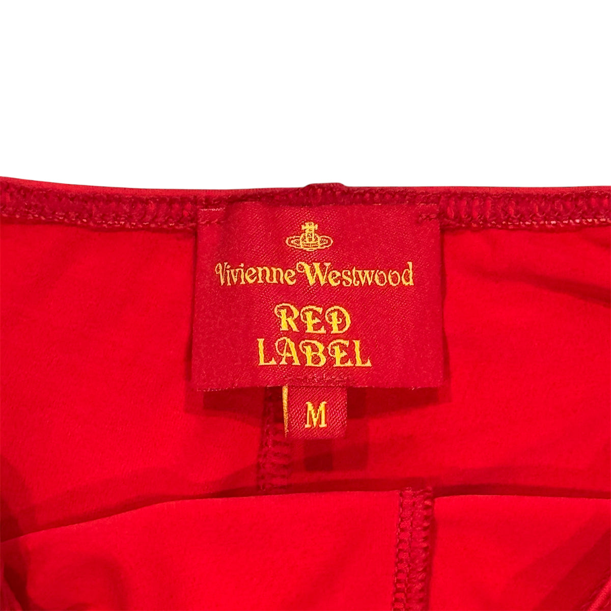 VIVIENNE WESTWOOD RED CUTOUT PANTS