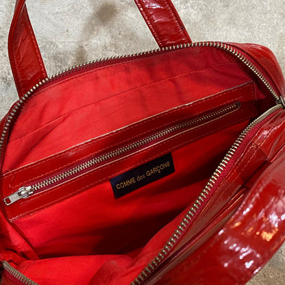 comme des garçon red bag